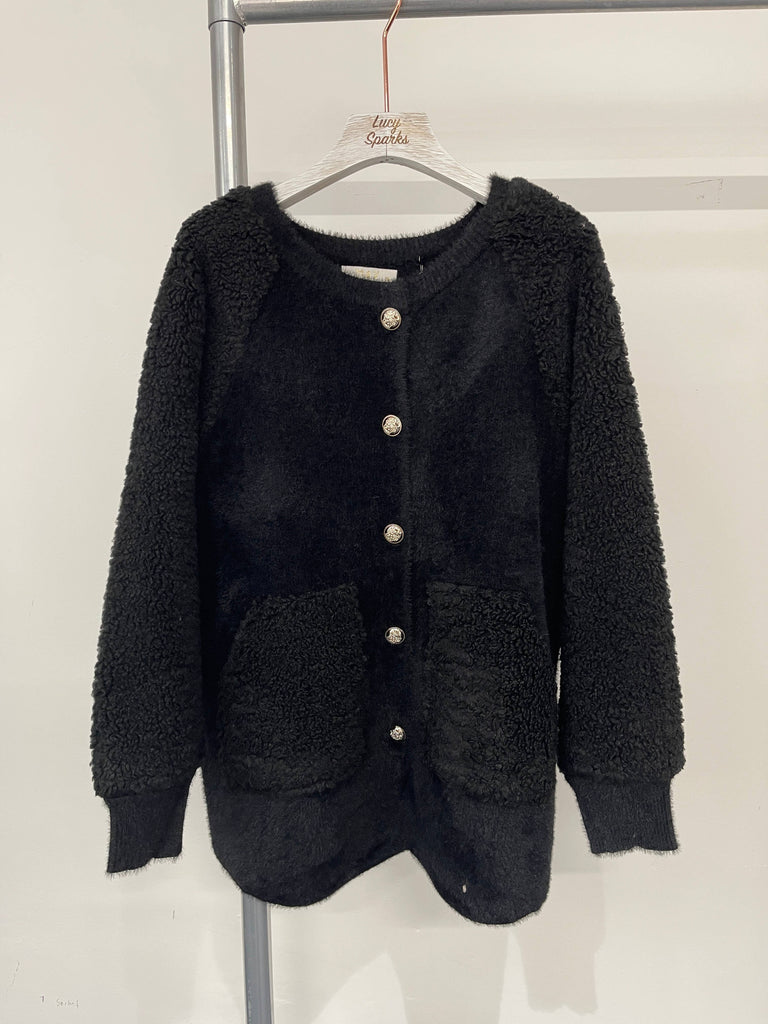 SOFT TEDDY JACKET WITH BUTTON FASTENING AND FRONT POCKETS: BLACK