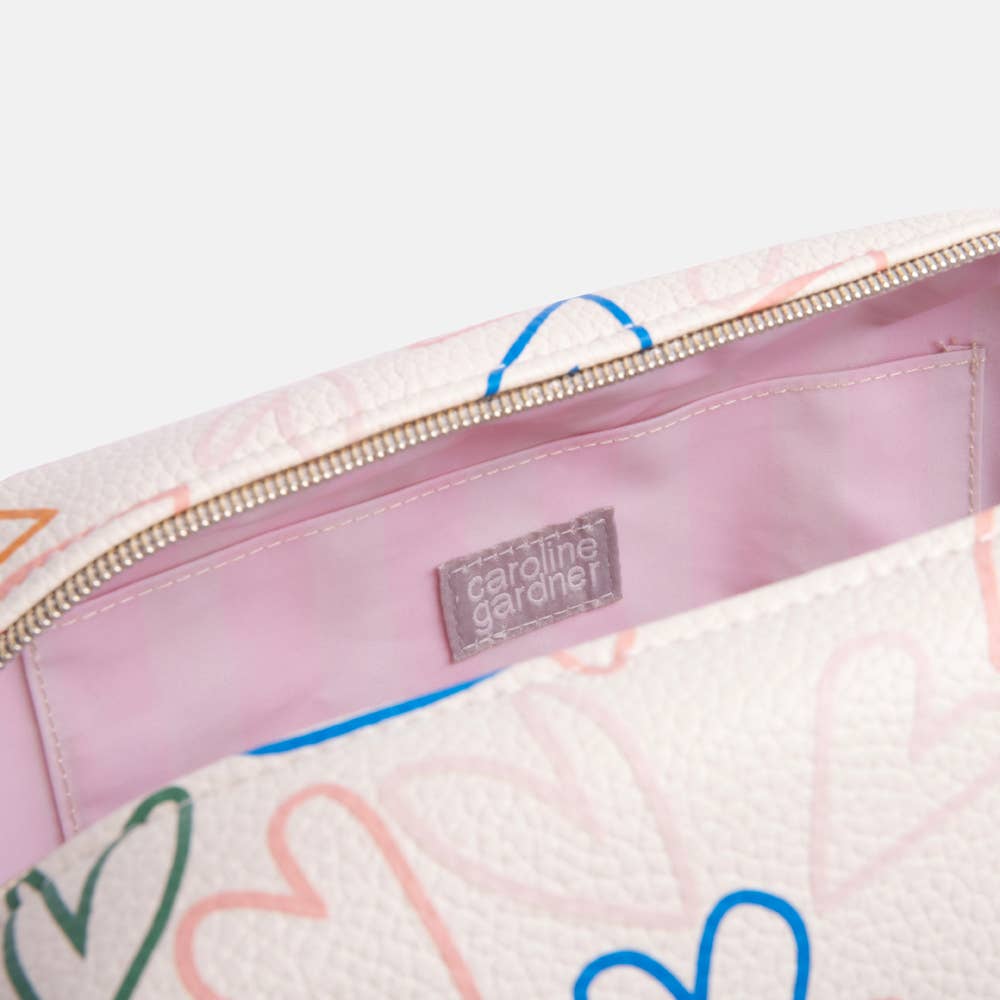 MULTI OUTLINE HEARTS LARGE TRAVEL WASHBAG